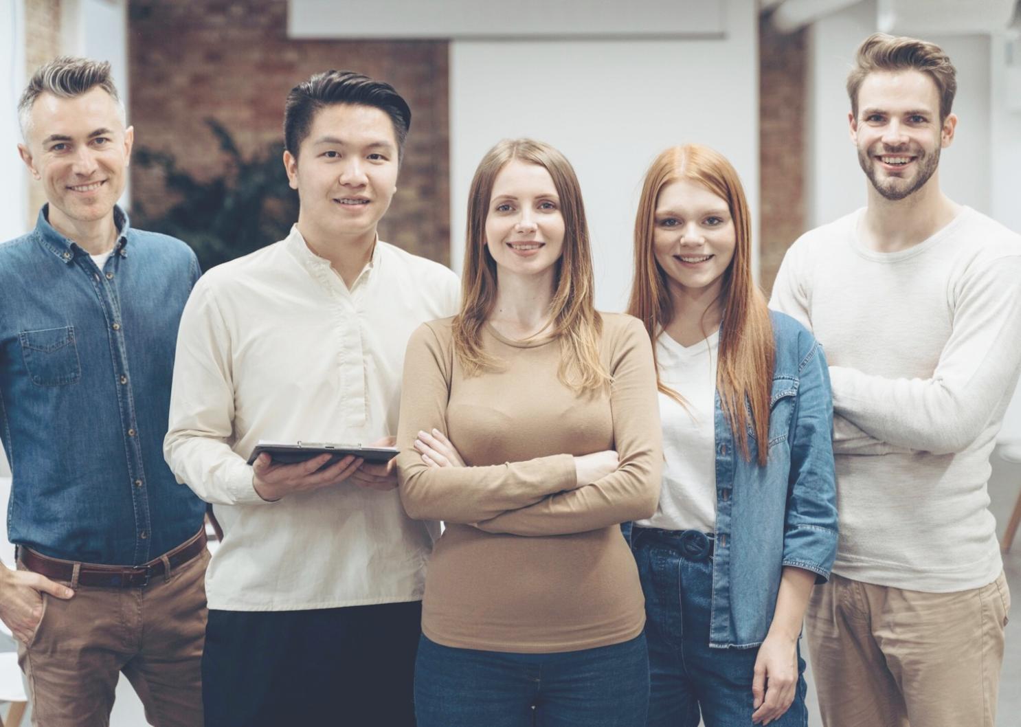 Professional presenting financial performance metrics to team in modern office setting